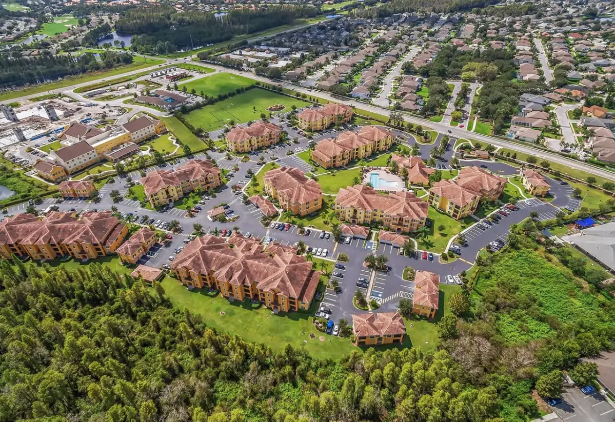 Aerial view of apartment community and neighbourhood