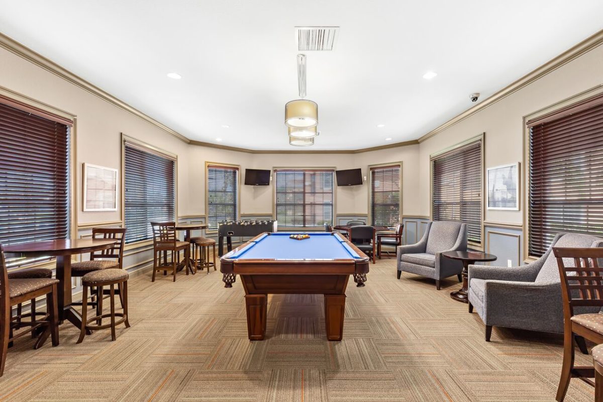 Club room featuring pool table, and seating