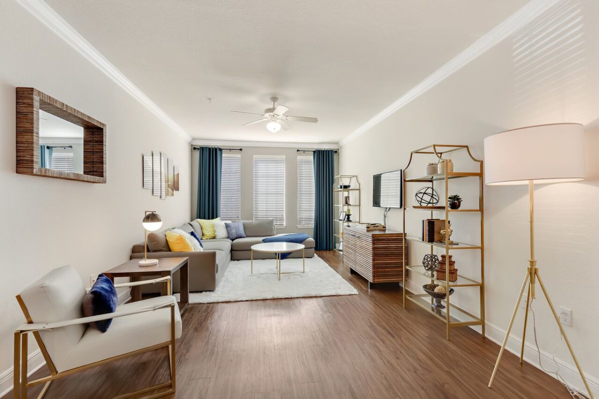 Living Room with big window, door and ceiling fan